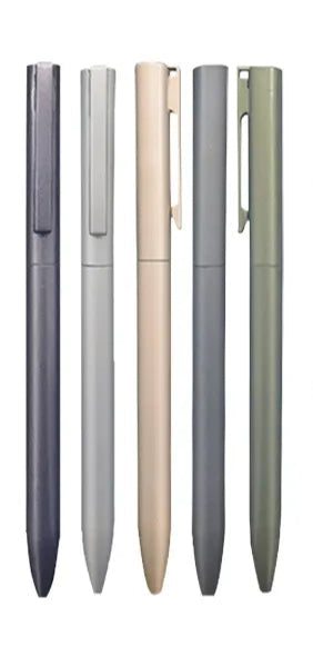 Set of pens with packaging and labels on a white background
