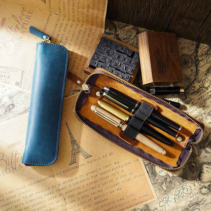 Leather case designed to hold four pens
