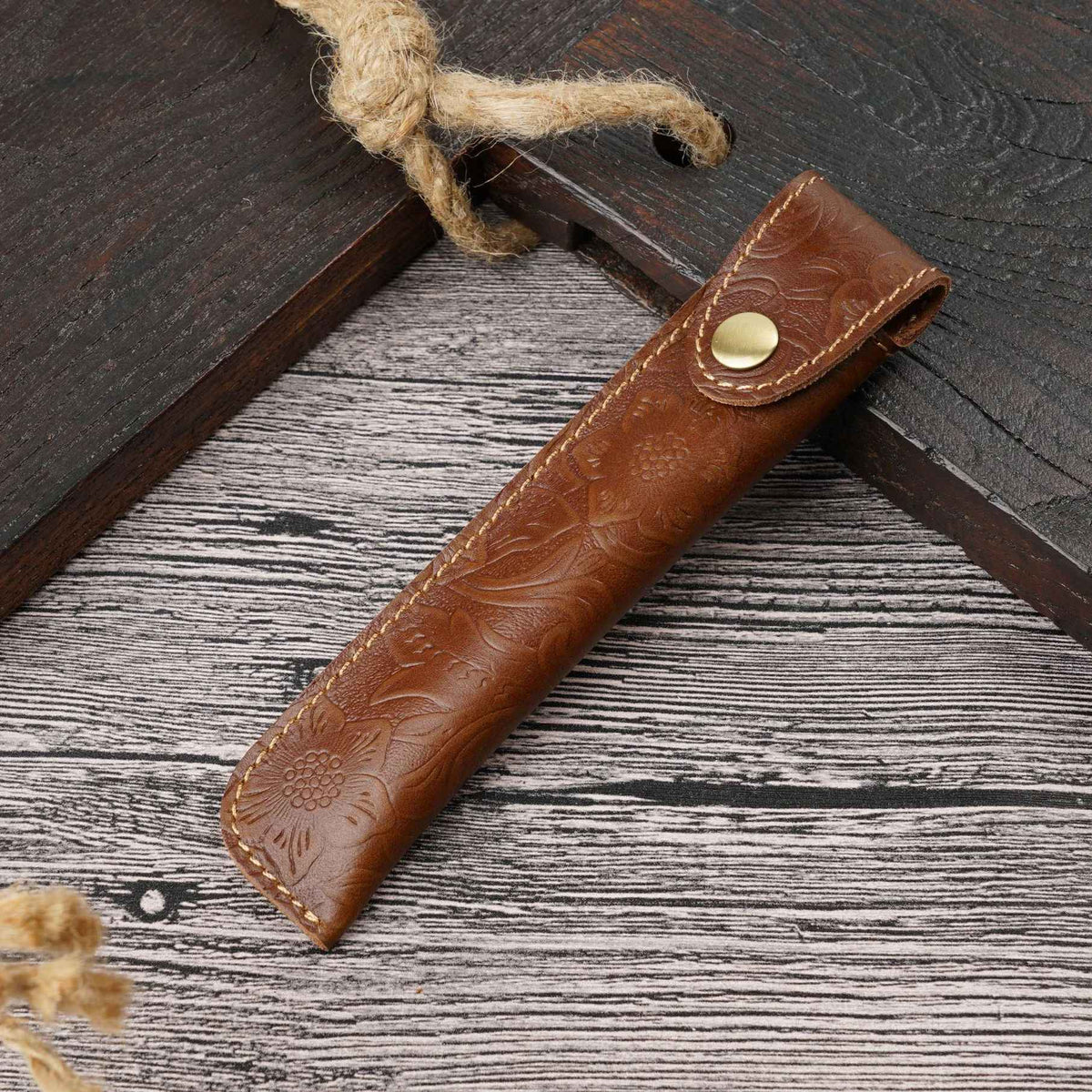Leather pen pouch positioned upright to show its slim protective design