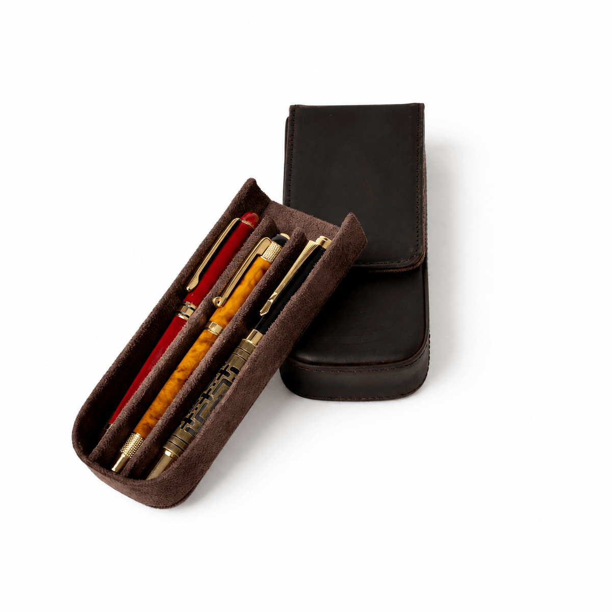 Leather pen case displaying its three-slot design