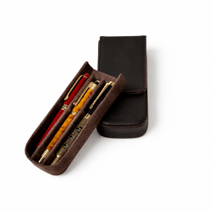 Leather pen case displaying its three-slot design