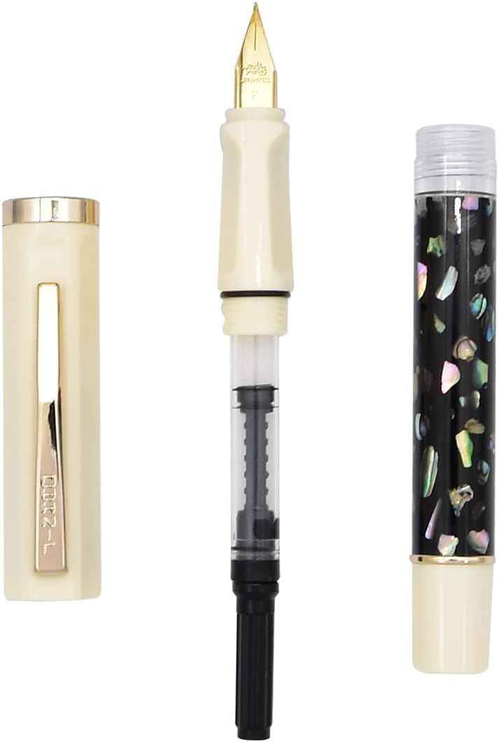 Fountain pen shown with its ornate shell-carved finish and writing nib