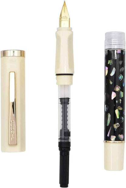 Fountain pen shown with its ornate shell-carved finish and writing nib