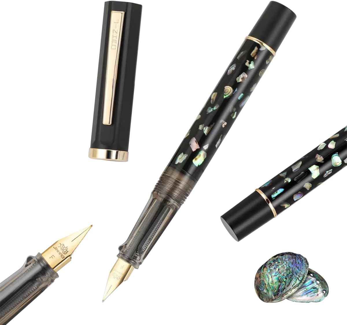 Decorative fountain pen with carved shell detailing and an iridium nib