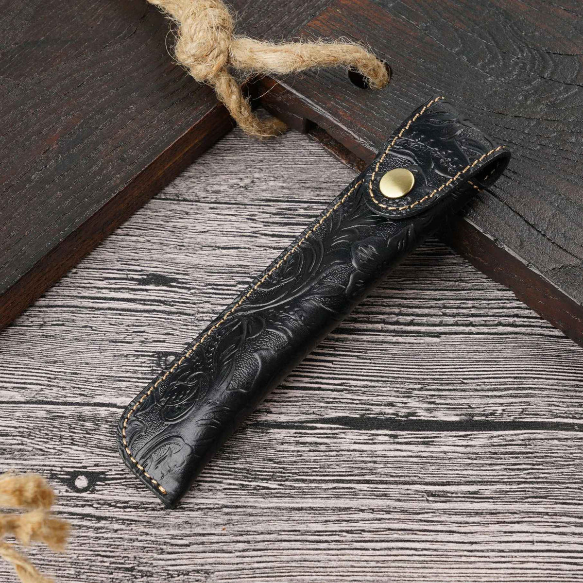 Single fountain pen resting beside its leather protective case