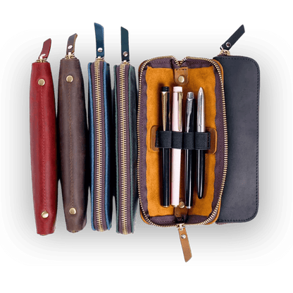 Compact zippered leather pen holder for a desk