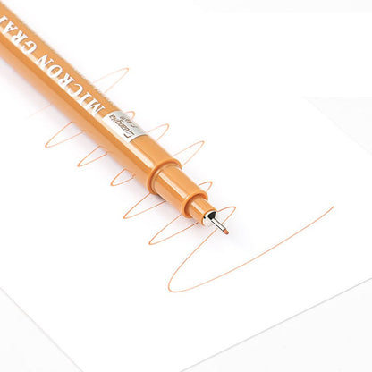 Close-up of fine needle pen tips from the 12-color set
