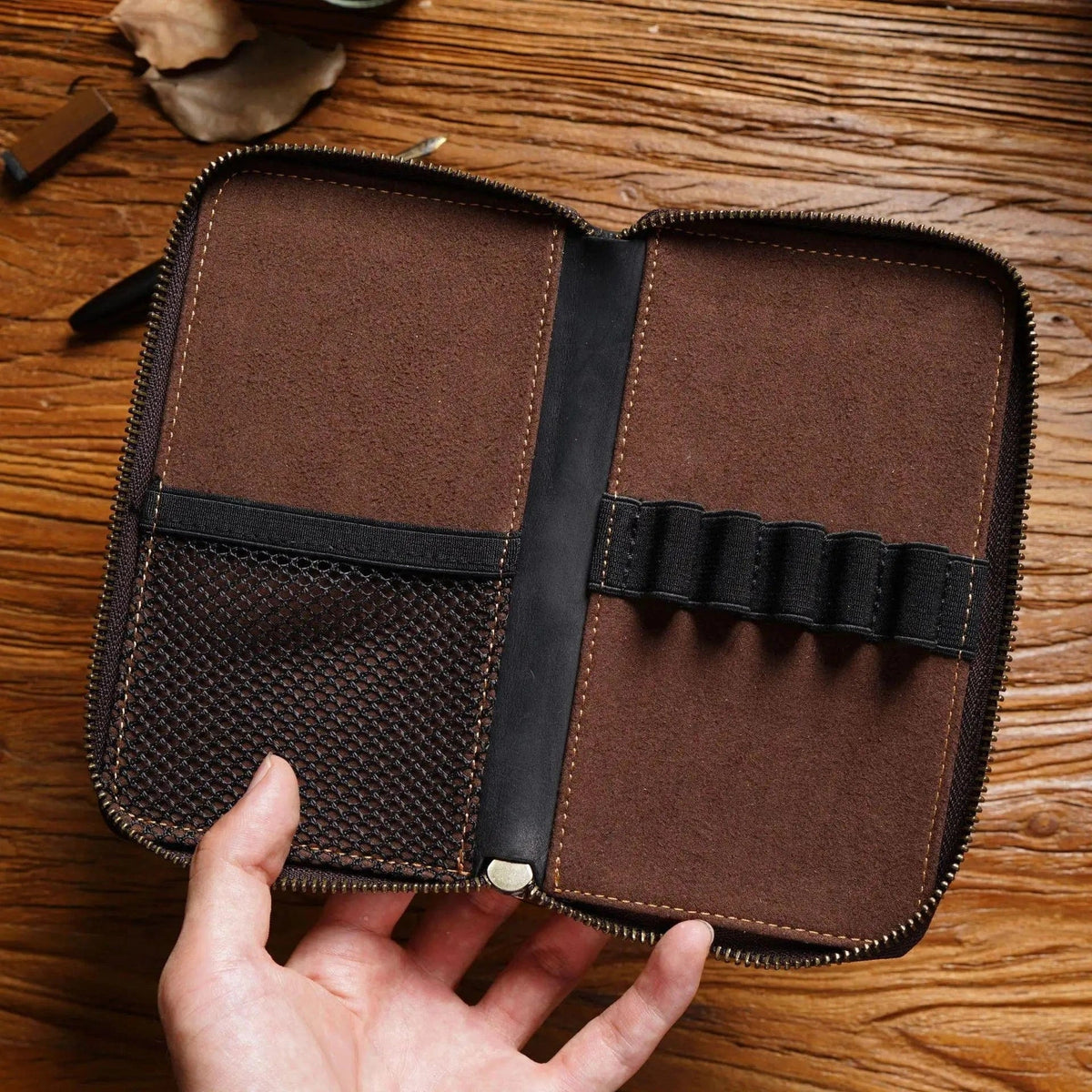 Leather pen holder designed to store five writing instruments