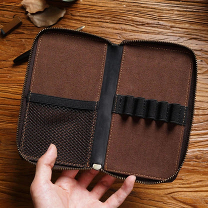 Leather pen holder designed to store five writing instruments