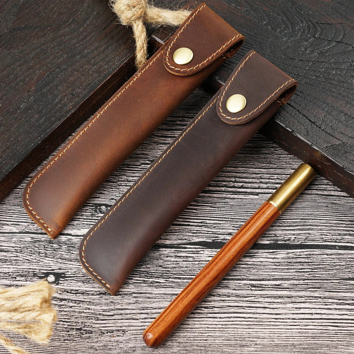 Leather single fountain pen case shown closed with a secure snap closure
