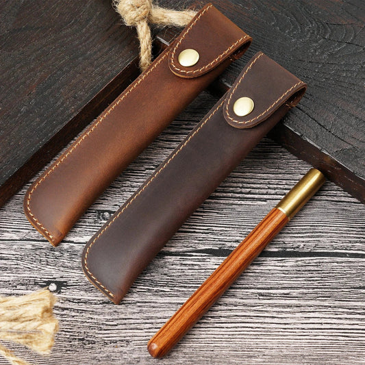 Leather single fountain pen case shown closed with a secure snap closure