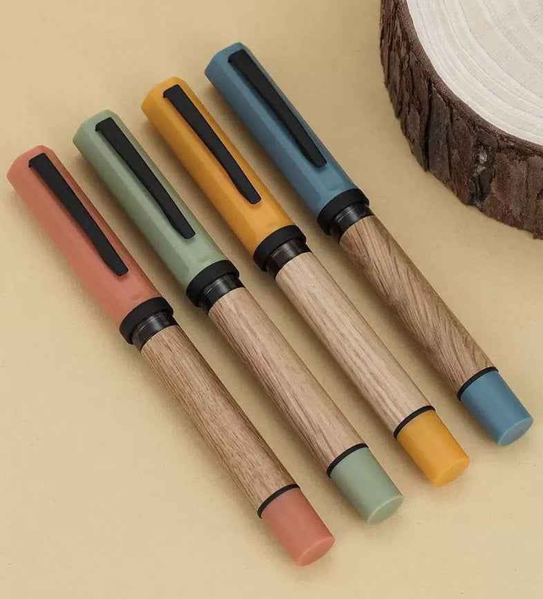 Wooden fountain pen with a natural oak finish displayed against a clean background