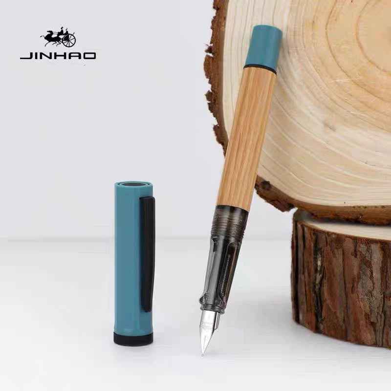 Wooden fountain pen showing its polished cap and secure clip