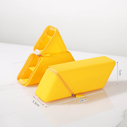 Pencil pouch displayed upright beside stationery
