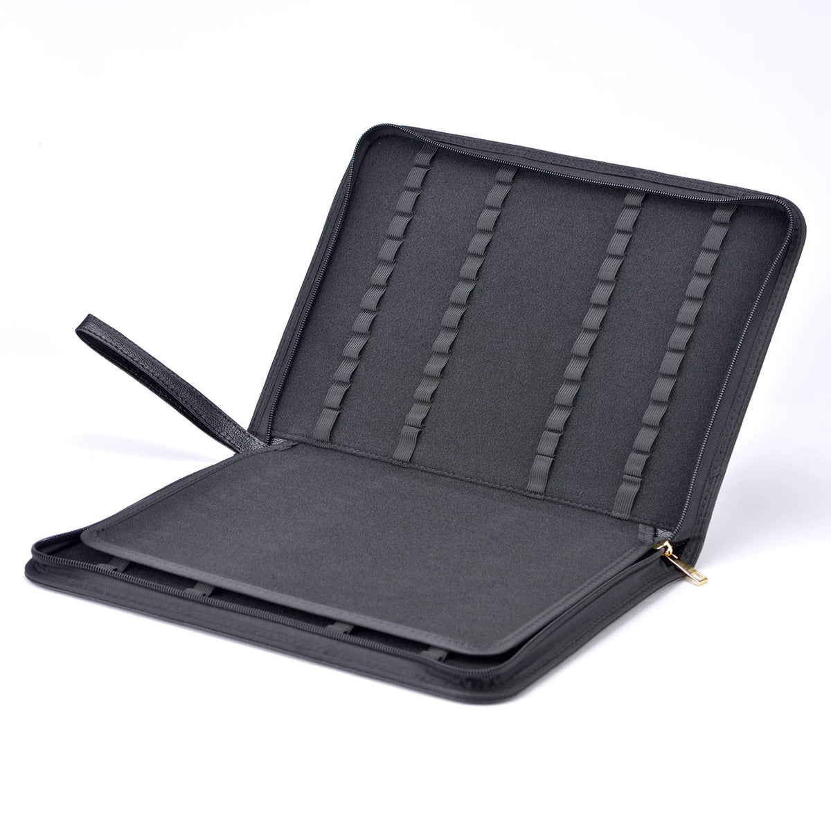 Open brown fountain pen case with multiple storage slots for fountain pens