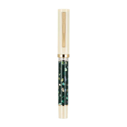 Fountain pen displaying its decorative shell-carved body