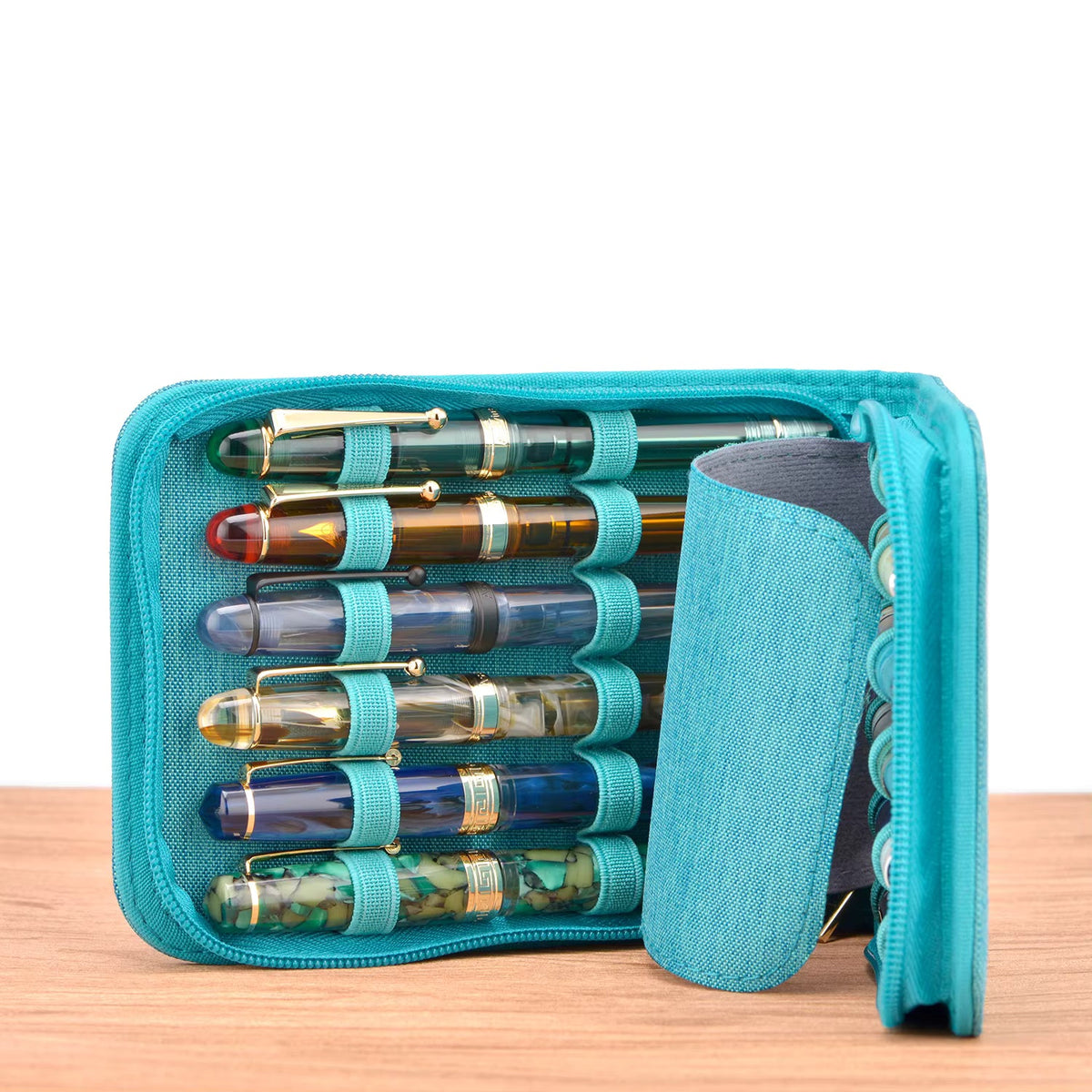 Open black pen case displaying space for up to 12 pens