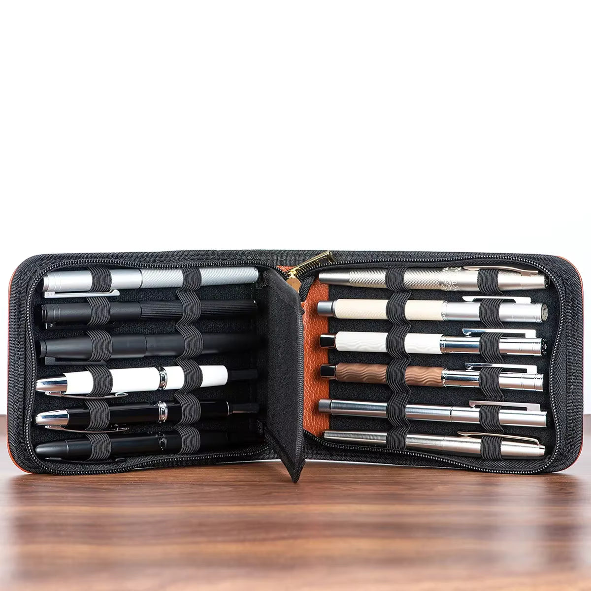 Blue 12-pen case with a protective divider for organized pens