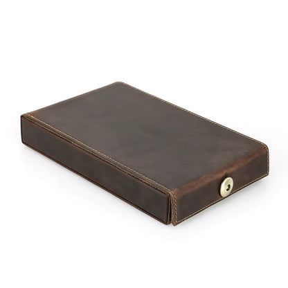 Closed leather pen case with a vintage-inspired design and magnetic flap