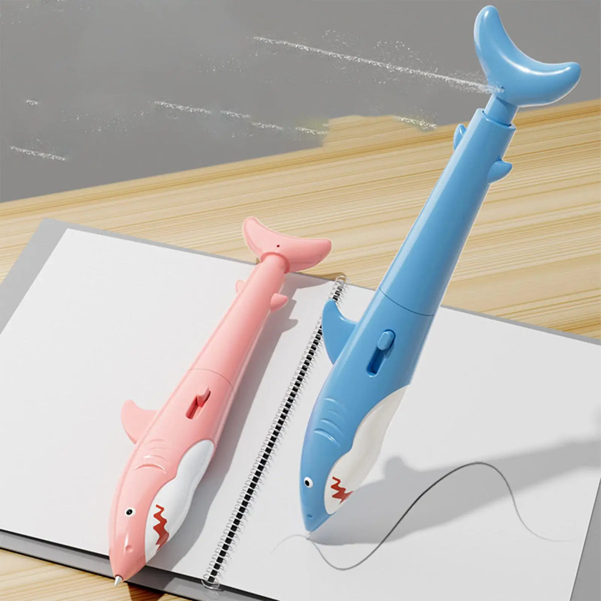 Close-up of the shark-shaped water squirter pen nozzle