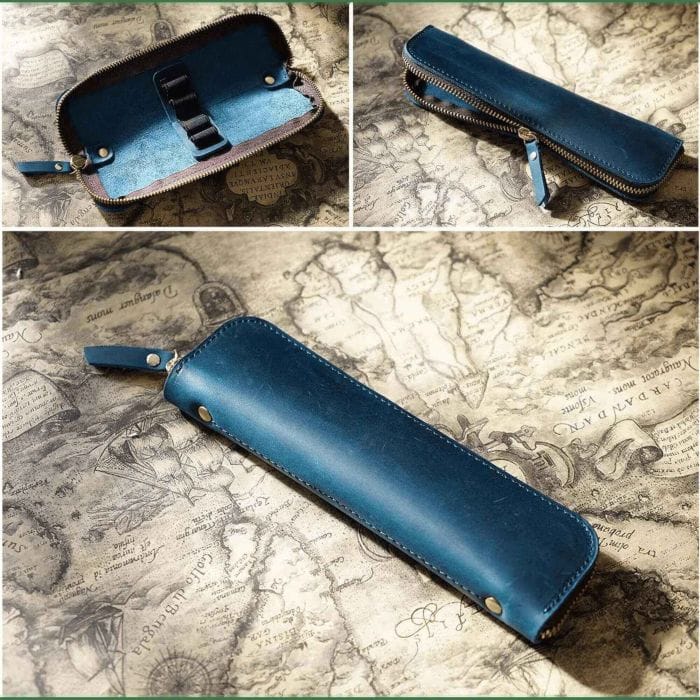 Open leather pen case displaying four pen slots