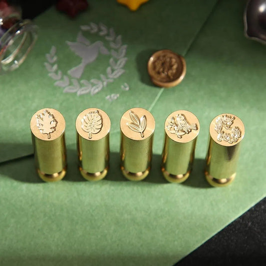 Cylindrical seal stamp displayed for letter and craft projects