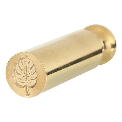 Cylindrical stamp shown as a tool for decorating letters