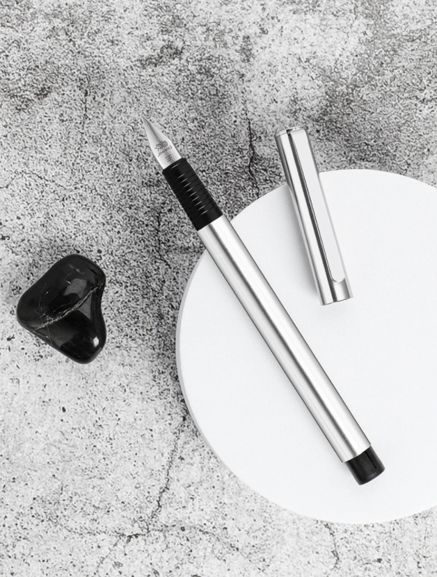 fountain pen, writing with a fountain pen, refillable fountain pens, pen with ink, pen store, nib pen, ink pen, fountain pens for sale, fountain pen shop, calligraphy, best pens